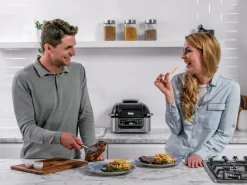 Ninja Grill und Heißluftfritteuse AG301EU Foodi Grau-Schwarz< Haushaltsgeräte