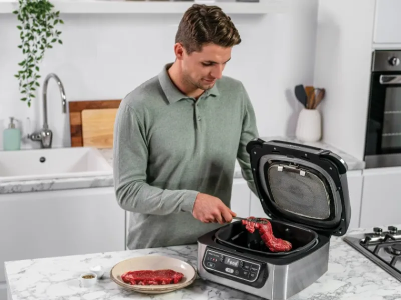 Ninja Grill und Heißluftfritteuse AG301EU Foodi Grau-Schwarz< Haushaltsgeräte